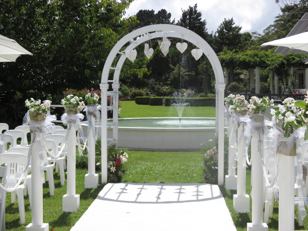 romantic archway decorated with hearts entrance to the bridal walkway